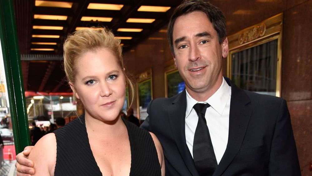 Amy Schumer and Chris Fischer