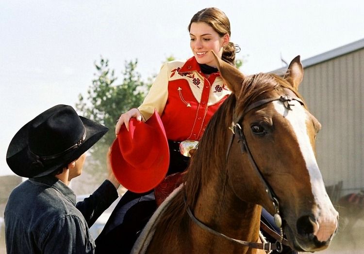 Anne Hathaway riding horseback